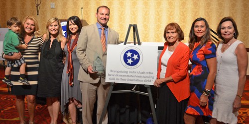 The family of the late Bob Parkins, owner, publisher and editor of the Milan Mirror-Exchange until his death in 2008, attended the ceremony for Parkins' posthumous induction into the 2015 class of the Tennessee Journalism Hall of Fame, held Aug. 11, 2015, at Embassy Suites in Murfreesboro, Tenn. (MTSU photo by Jimmy Hart)