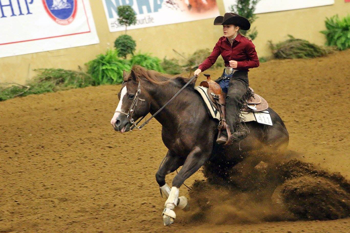 MTSU rider Delaney Rostad performs a sliding stop aboard Peppy, a State University of New York-Oswego horse provided for the competition at Kentucky Horse Park in Lexington, Ky. (Submitted photo by Mark King