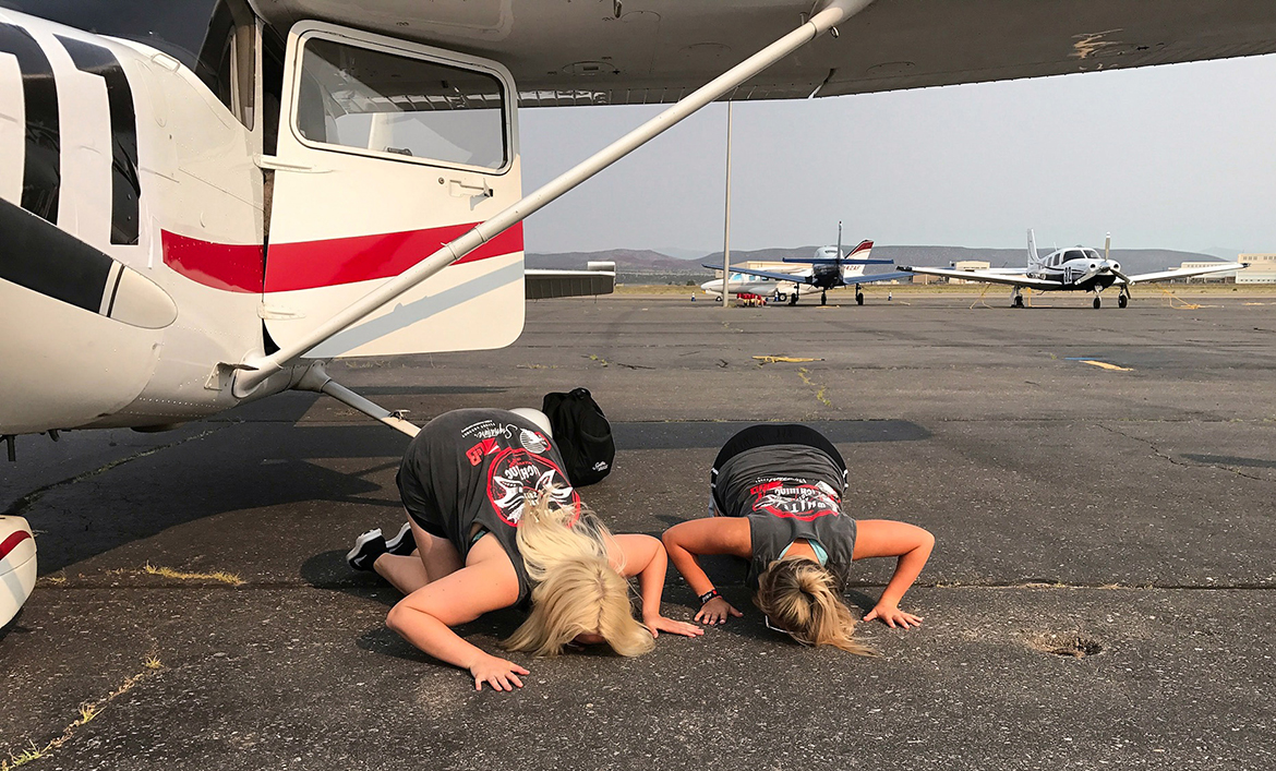 MTSU Air Race Classic entries kiss the ground after reaching final destination.
