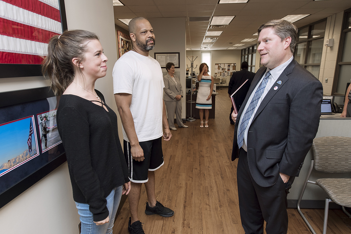 The VA's Scott R. Blackburn talkes to MTSU students Delaney Dickey and Darrell Wright.