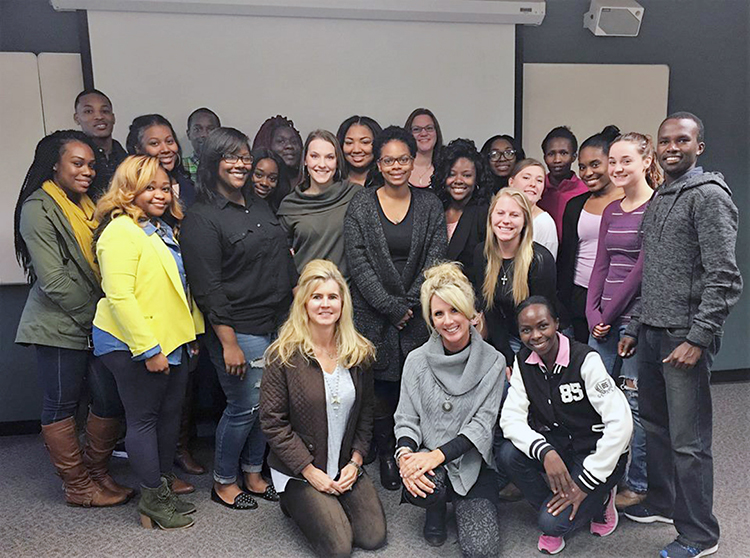 Interns who have worked on projects for MTSU’s Center for Health and Human Services pose with interim center director Cynthia Chafin, who is shown kneeling at left on the front row. Their internships help promote healthy lifestyles and enrich their educational experiences. (Photo submitted)