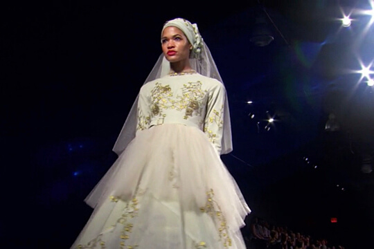 A model on the reality TV competition “Project Runway” displays one of MTSU alumna Ayana Ife’s creations during the show’s Nov. 16 finale episode. (Photo courtesy of Lifetime)