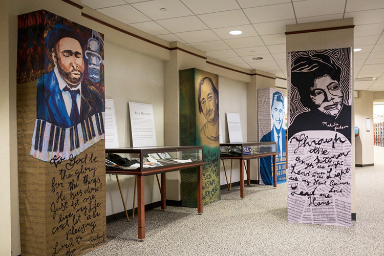Tapestries of Gospel Music Hall of Fame inductees Andrae Crouch, Rich Mullins, Bill Gaither and Mahalia Jackson adorn an exhibit of gospel music artifacts on display in the James E. Walker Library. Each of the tapestries features lyrics from the artist’s best-known song, including Crouch’s “My Tribute (To God Be the Glory),” Mullins’ “Awesome God,” Gaither’s “Because He Lives” and Jackson’s “Take My Hand, Precious Lord.” (photo submitted)