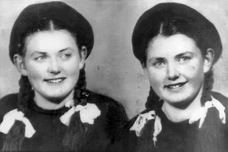 Auschwitz survivors Eva Mozes Kor, left, and her identical twin sister, Miriam Mozes Zieger, are shown in 1949 in Romania, four years after Soviet troops liberated the concentration camp where they were held captive and subjected to scientific experimentation from 1944 to 1945. The women went on to live in Israel, marry and have families, and establish the Children of Auschwitz Nazi Deadly Lab Experiments Survivors organization. (Photo submitted)