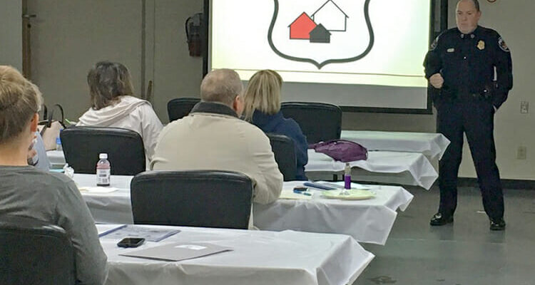 Murfreesboro Police Chief Mike Bowen, standing right, speaks to representatives from area apartment complexes Friday, Feb. 16, during a daylong training for the Crime Free Multi-Housing Program at the Police Annex on South Church Street. (City of Murfreesboro photo)