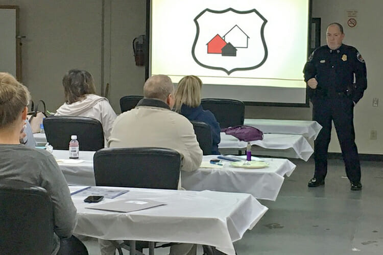 Murfreesboro Police Chief Mike Bowen, standing right, speaks to representatives from area apartment complexes Friday, Feb. 16, during a daylong training for the Crime Free Multi-Housing Program at the Police Annex on South Church Street. (City of Murfreesboro photo)