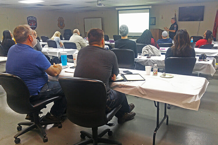 Murfreesboro Police Sgt. Harry Haigh, standing at lectern, speaks to representatives from area apartment complexes Friday, Feb. 16, during a daylong training for the Crime Free Multi-Housing Program at the Police Annex on South Church Street. (City of Murfreesboro photo)