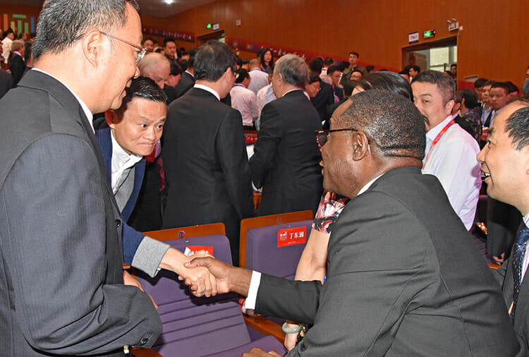 Alibaba Group co-founder and executive chairman Jack Ma, second from left, congratulates MTSU President Sidney A. McPhee after McPhee’s keynote address Monday, May 14, at Hangzhou Normal University’s 110th anniversary celebration. Ma, a Chinese business magnate, investor and philanthropist, is a prominent alumnus of HNU. (MTSU photo by Andrew Oppmann)