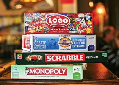 A stack of popular board games.