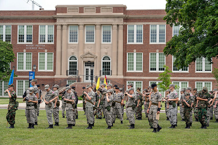 Cadets attending the Civil Air Patrol’s 2018 Tennessee Wing Encampment take a water break during morning reveille outside Wiser-Patton Science Hall on the MTSU Science Corridor of Innovation. (MTSU photo by J. Intintoli)