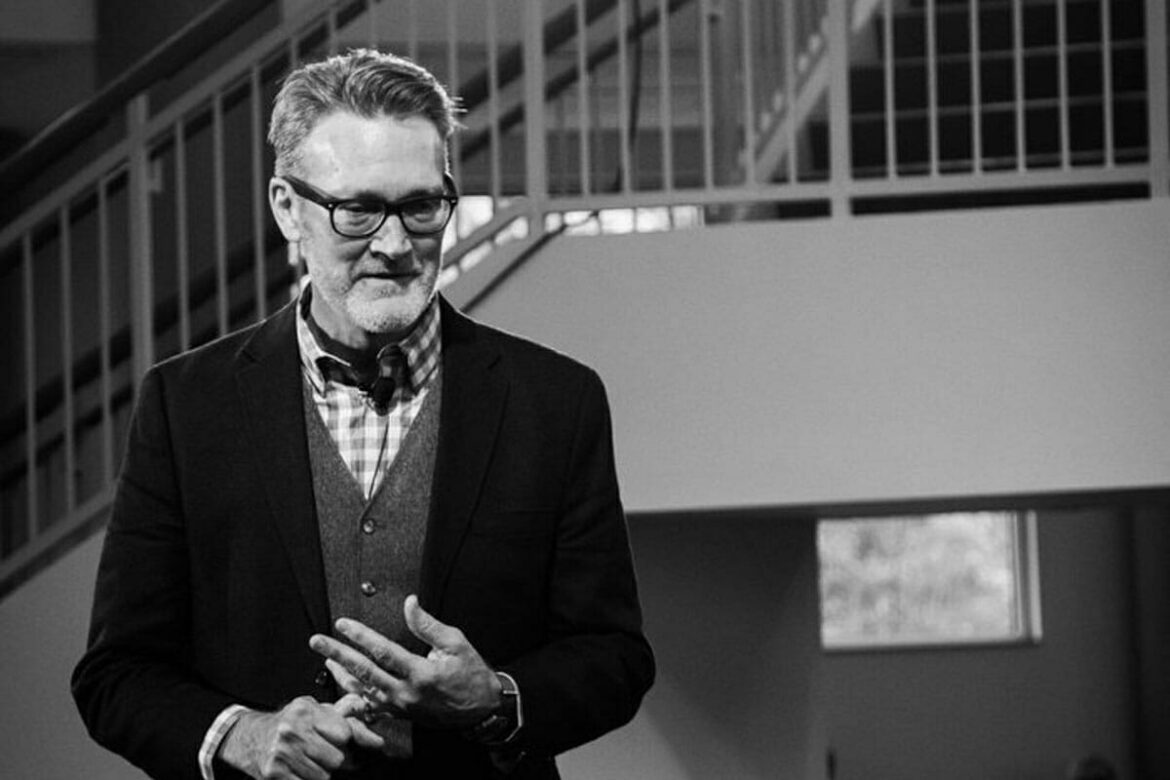 Textiles, Merchandising, and Design Program professor Rick Cottle speaks at the 2018 Spring Runway Fashion Show in the Miller Education Center. (MTSU photo by John Goodwin)