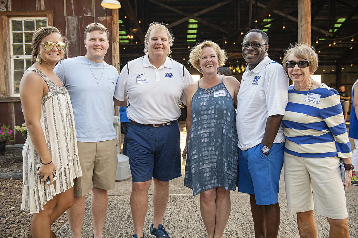2018 Pigskin Pregame host family with President Sidney A. McPhee