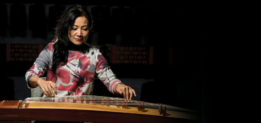 Dr. Mei Han, director of MTSU's Center for Chinese Music and Culture, plays the zheng, or ancient zither, in this photo for her album cover.