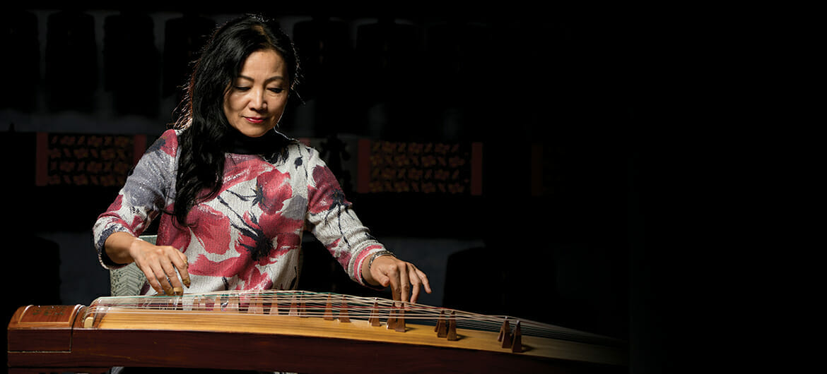Dr. Mei Han, director of MTSU's Center for Chinese Music and Culture, plays the zheng, or ancient zither, in this photo for her album cover.