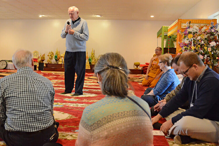 Father Joe Pat Breen, a retired Catholic priest, delivers the Christian blessing before an interfaith luncheon at Wat Amphawan Buddhist Temple in Murfreesboro in this January 2016 file photo. The luncheon, which was co-hosted by the temple, the American Democracy Project, the MTSU Center for Historic Preservation and the Family of Abraham, helped kick off a program funded by a National Endowment for the Humanities grant, “Bridging Cultures at Community Colleges,” focusing on “Religious Pluralism in Middle Tennessee.” (MTSU file photo by Gina K. Logue)