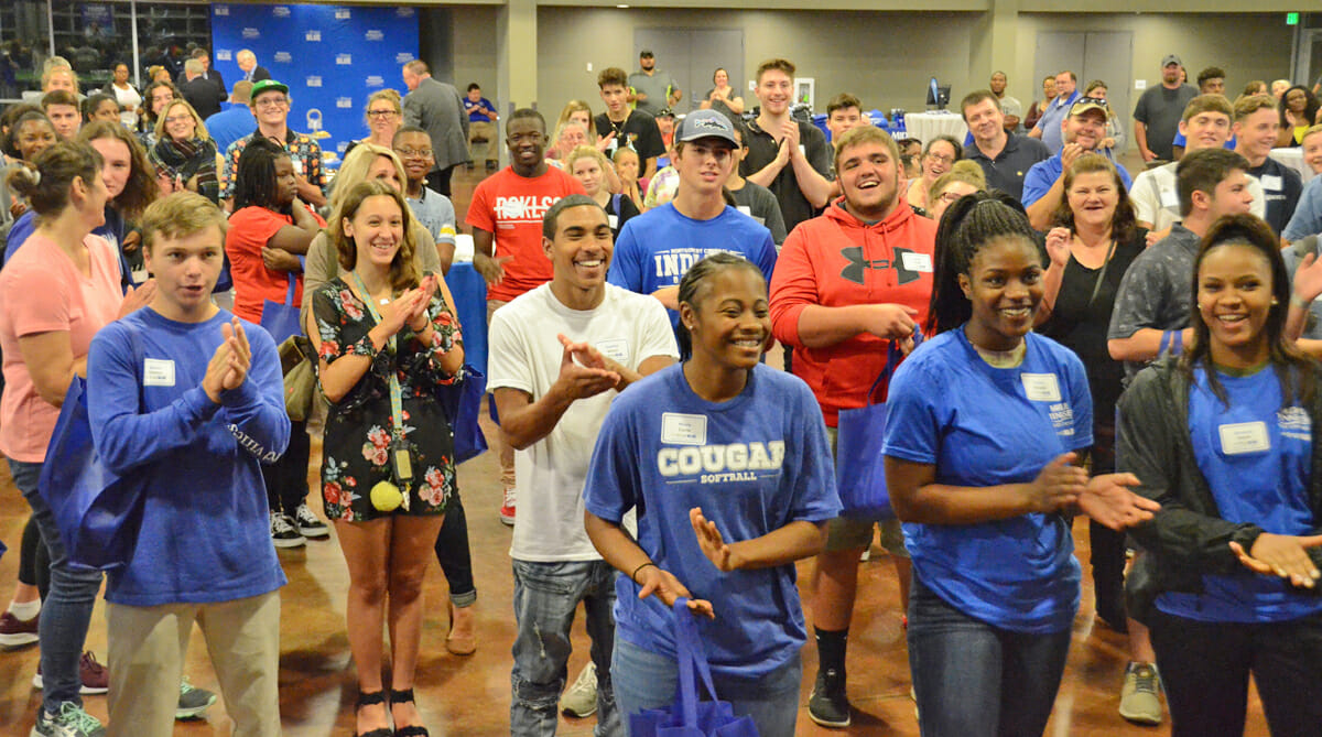 Students attending the MTSU True Blue Tour event in September 2018 in Clarksville, Tenn., show their approval for President Sidney A. McPhee’s awarding of a scholarship and other giveaways. MTSU will bring the tour and an announcement of another guaranteed scholarship back to Clarksville Thursday, Oct. 10, with a luncheon for counselors and community college staff and 6 p.m. student reception, both at TownePlace Suites, 120 Fair Brook Place. (MTSU file photo by Randy Weiler)