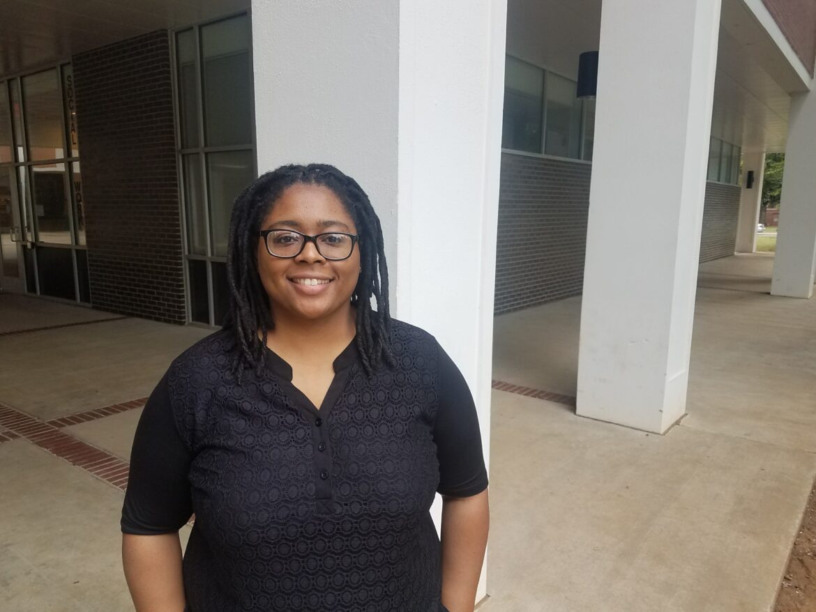 Dr. Nikki Jones standing in Peck Hall.