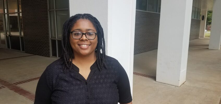Dr. Nikki Jones standing in Peck Hall.
