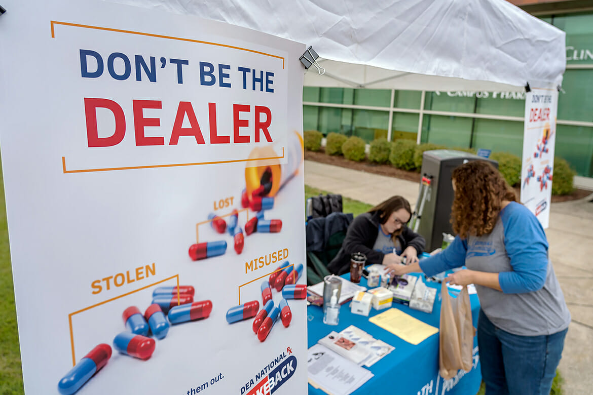 Meg Cothern, seated, a fourth-year student with the University of Tennessee College of Pharmacy, and MTSU pharmacist Tabby Ragland log unwanted medications turned in Thursday during the Campus Pharmacy/University Police drug take-back event at the Campus Recreation Center. This event is part of the Drug Enforcement Administration’s overall efforts to remove excess drugs from communities where they could be abused or misused, diverted into the wrong hands or disposed of in environmentally unsafe ways. (MTSU photo by J. Intintoli)