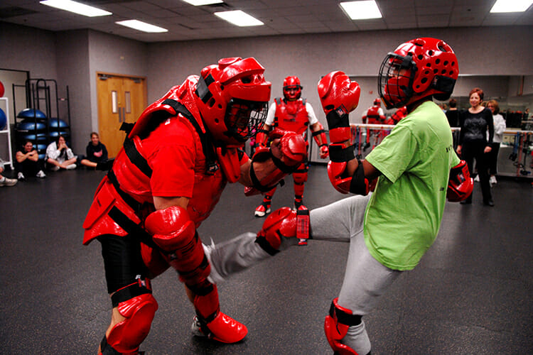 A Rape Aggression Defense Systems instructor, wearing red protective gear, tangles with a student during a RAD course at Luke Air Force Base, Arizona, in this file photo. The MTSU Police Department is again teaching the basic RAD course this fall for the campus community beginning Tuesday, Sept. 7, through Sept. 30. (U.S. Air Force photo courtesy of Airman First Class David Bulkley/Luke AFB)