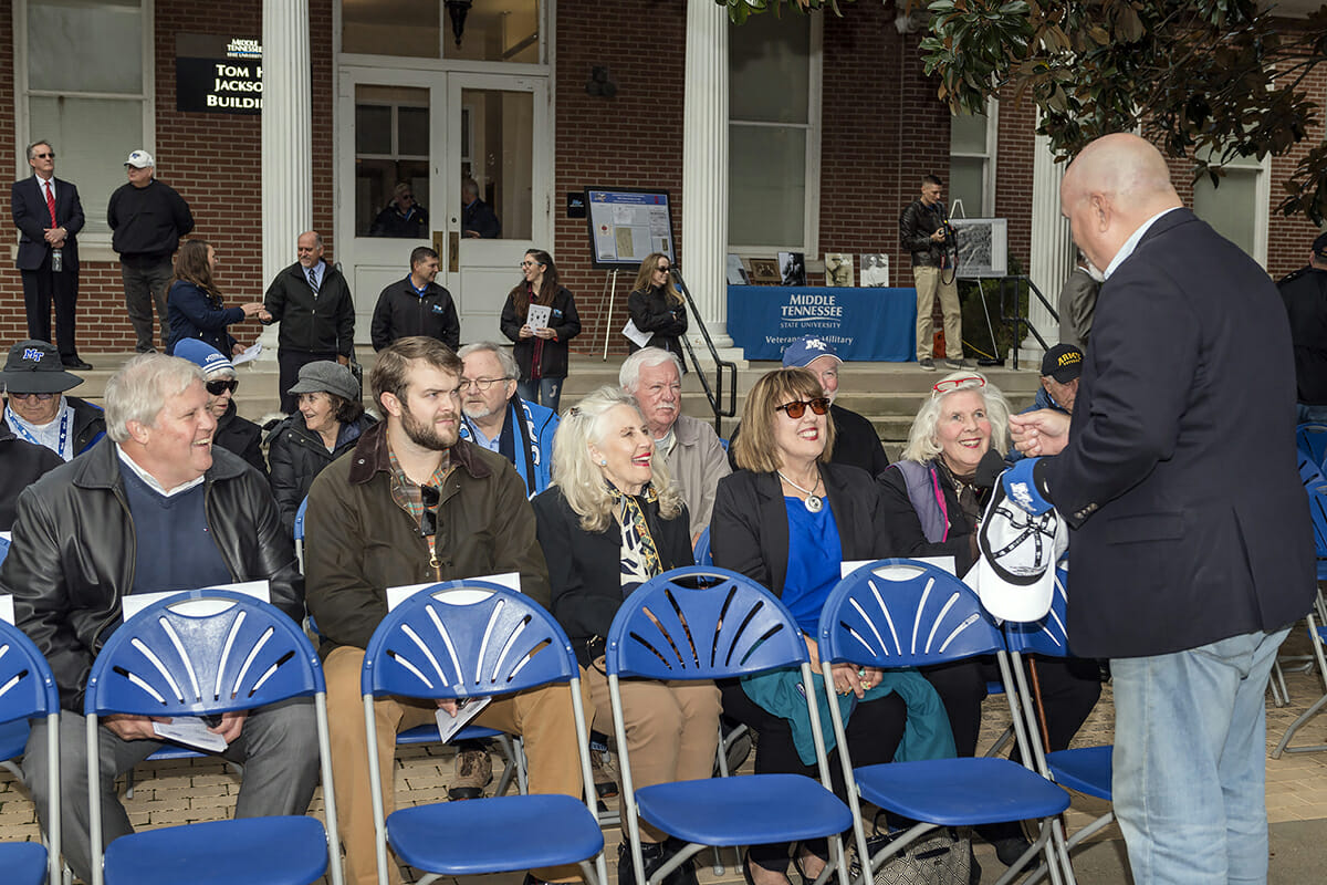 Elroy family members attend memorial service.