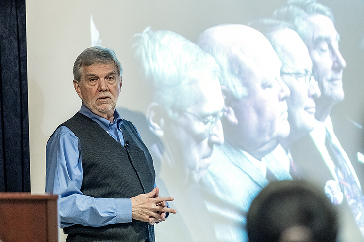 MTSU alumnus, author and consultant Keel Hunt listens to a question from the audience last November during a return visit and talk in MTSU’s Honors Lecture Series on Tennessee’s gradual switch “From Blue State to Red” between the 1950s and today. He'll be back at MTSU Wednesday, April 17, to continue urging Tennessee — and the nation — to learn from our state’s history and clear the stagnant political climate by “Crossing the Aisle," which also is the title of his new book. Four Tennessee governors are shown in the photo displayed behind Hunt: from left are Gov. Don Sundquist, Gov. Ned Ray McWherter, former governor and now U.S. Sen. Lamar Alexander, and Gov. Winfield Dunn. (MTSU file photo by J. Intintoli)