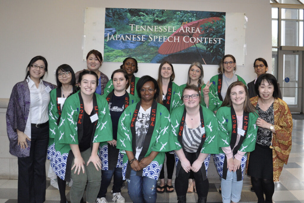 MTSU Japanese program student volunteers, in green, and instructors pose for a photo during the 12th annual Tennessee Area Japanese Speech Contest hosted on campus in early April. (Submitted photo)