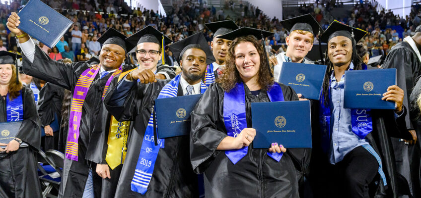 A newly minted group of MTSU’s Class of 2019 proudly display their degrees as they prepare to leave Murphy Center Aug. 10 after the university’s summer 2019 commencement ceremony. MTSU's fall 2019 commencement ceremonies are set Saturday, Dec. 14.(MTSU file photo by J. Intintoli)