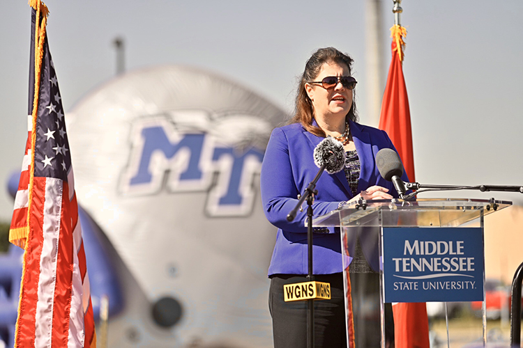 State Sen. Dawn White, an MTSU alumna, praises the university’s faculty and staff for producing ‘thousands’ of area graduates at the Thursday, Sept. 5, dedication ceremony of the newly named Blue Raider Bridge. (MTSU photo by J. Intintoli)