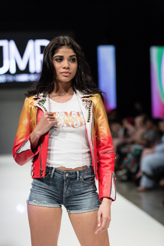 Model standing on runway during Nashville Fashion Week 2019 event representing designer Justin Mark Richards. Photo by John Hillin.
