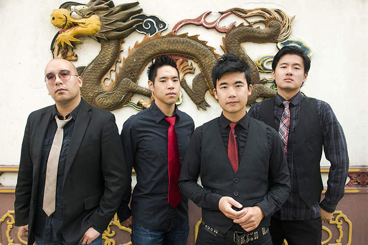 Musicians The Slants, shown in this 2015 promotional photo in Old Town Chinatown, Portland, Oregon, are, from left, drummer Tyler Chen, lead singer Ken Shima, founder and bassist Simon Tam, and guitarist Joe X. Jiang. Tam will visit MTSU Tuesday, Sept. 24, for a free public discussion of his nearly seven-year battle to trademark his band’s name. (Photo courtesy of Anthony Pidgeon/Redferns)
