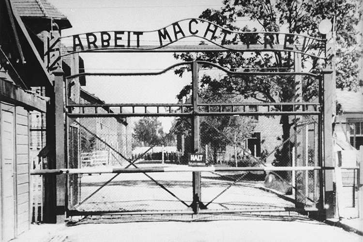 This file photo from the United States Holocaust Memorial Museum archives, taken in May 1945, shows the entrance to the main camp of Auschwitz in southern Poland. The gate bears the motto "Arbeit Macht Frei," or "work makes one free." (Photo from Instytut Pamieci Narodowej, or The Institute of National Remembrance – Commission for the Prosecution of Crimes against the Polish Nation, courtesy of USHMM Photo Archives)
