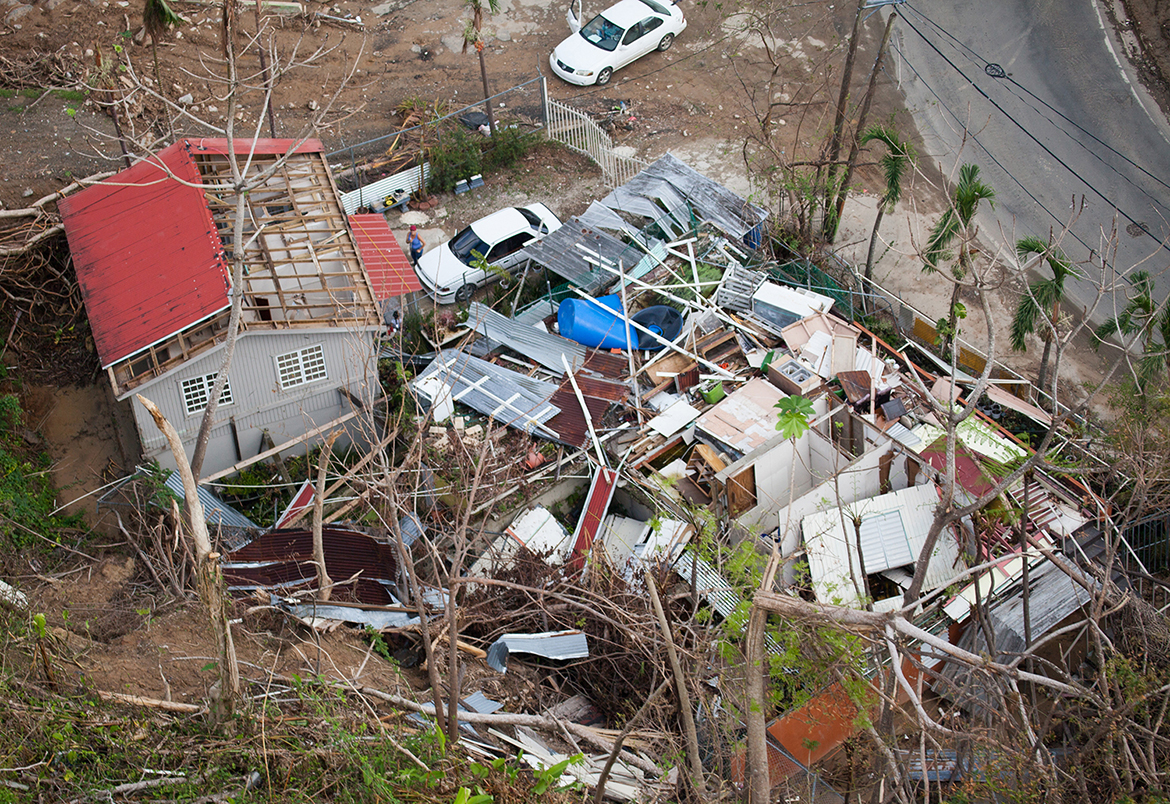 Naranjito, Puerto Rico -- Aerial view of a damaged home in the mountainous area of Naranjito, Puerto Rico. After Hurricane Maria, many homes, businesses, roads, bridges, and government buildings suffered major damage from strong winds and heavy rain. (Photo courtesy of Andrea Booher/Federal Emergency Management Agency)