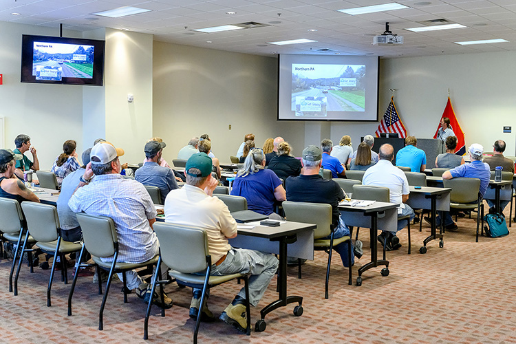 A room full of attendees at the Tennessee Ginseng Growers Fall Meeting held recently at MTSU’s Miller Education Center listen to a presentation by Eric Paul Burkhart, faculty instructor in the Ecosystem Science and Management Department at Penn State University, and program director for the Appalachian Botany and Ethnobotany at Shaver’s Creek Environmental Center. The meeting was sponsored by the MTSU International Ginseng Institute. (MTSU photo by J. Intintoli)