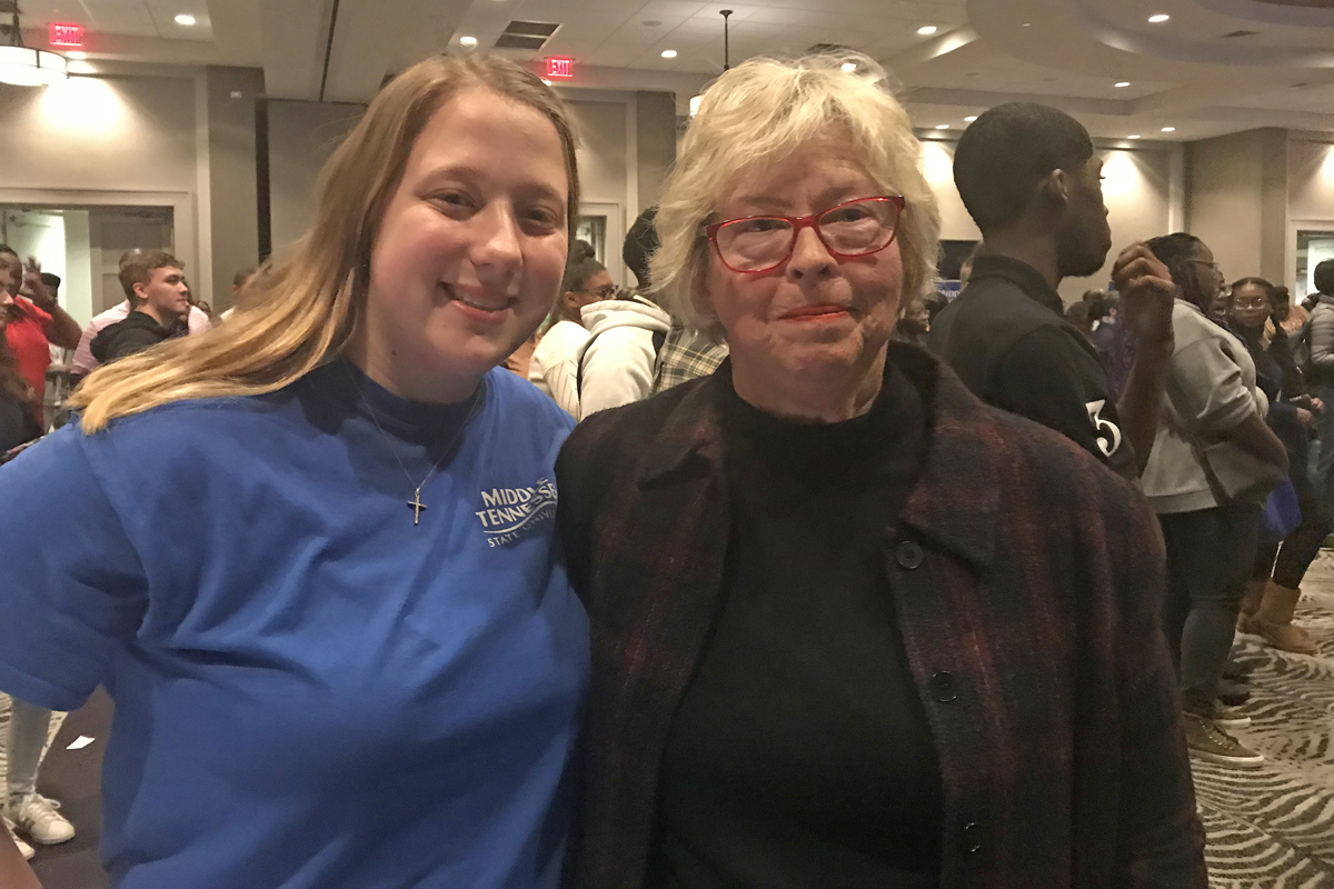 Kelly Szczepanski, left, and MTSU friend Connie Smith, regional director with AdvancED/Cognia, posed after Smith provided a $4,000 scholarship to the aspiring special education teacher Wednesday, Nov. 6, at the True Blue Tour event at Esplande Memphis in Cordova, Tenn. (MTSU photo by Randy Weiler)
