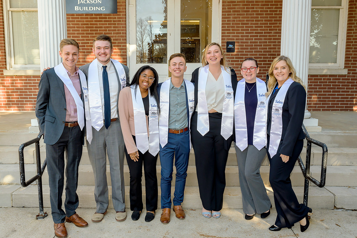MTSU’s Department of Marketing Professional Selling Concentration held its inaugural Stole Ceremony on Nov. 19 at the Tom H. Jackson Building for graduating students who enrolled in the new concentration within the Jones College of Business. Pictured, from left, are students Caleb (Tate) Huffman, Drew Christiansen, Faith Rodgers, Forrest Mason, Kayli Jones, Christine Owens and Amanda Post. (MTSU photo by Andy Heidt)