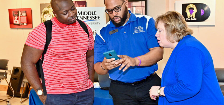 As a Nashville State Community College student in February 2019, Dravidi Pasha, left, receives advice about transferring from MTSU transfer coordinators Zach Thompson and Jeana Nier. Pasha is a senior in the Jones College of Business. The “MTSU Promise Tour runs from Jan. 28 through Feb. 13 at nine community colleges. MTSU takes its “True Blue Pathway” event to Nashville State’s main campus Feb. 4. (MTSU file photo by Andy Heidt)