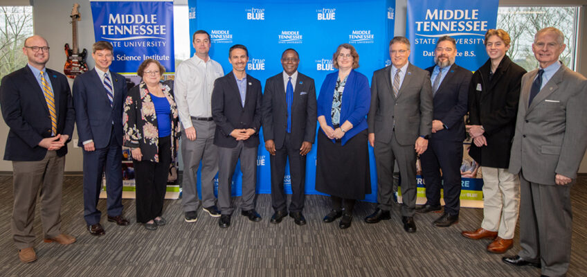 MTSU President Sidney A. McPhee, center, is joined by university faculty and staff as well as other supporters at the kickoff of the university’s Tennessee Data Initiative held Tuesday, Feb. 18, at the Nashville Technology Council’s headquarters. Pictured, from left, are Mike Krause, executive director of the Tennessee Higher Education Commission; state Rep. Charlie Baum, an MTSU finance professor; Mary Martin, MTSU mathematics professor and Board of Trustee faculty representative; Ryan Otter, MTSU biology professor and co-director of the MTSU Data Science Institute; Charlie Apigian, information systems and analytics professor and co-director of the Data Science Institute; MTSU President Sidney A. McPhee; Lisa Green, interim chair of mathematical sciences; MTSU Provost Mark Byrnes; David Butler, dean of the College of Graduate Studies; Cayson Seipel, MTSU freshman information systems major; and Tom Boyd, Board of Trustees member. (MTSU photo by James Cessna)