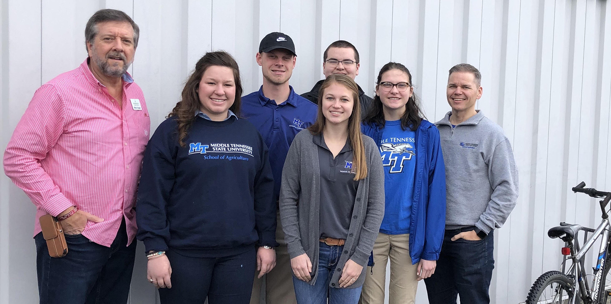 Greenhouse Ministry’s Mike Dugan, left, MTSU ag mechanics class members Lindsey Parsley, Jacob Tipton, Bridget Robertson, Jacob Neal and Abigail McConnell and assistant professor Chaney Mosley are shown with one of the bicycles repaired by the students. The class and Collegiate FFA gave four bicycles they had repaired to the Murfreesboro nonprofit earlier this year to provide transportation so homeless people can find and maintain work. (Submitted photo)