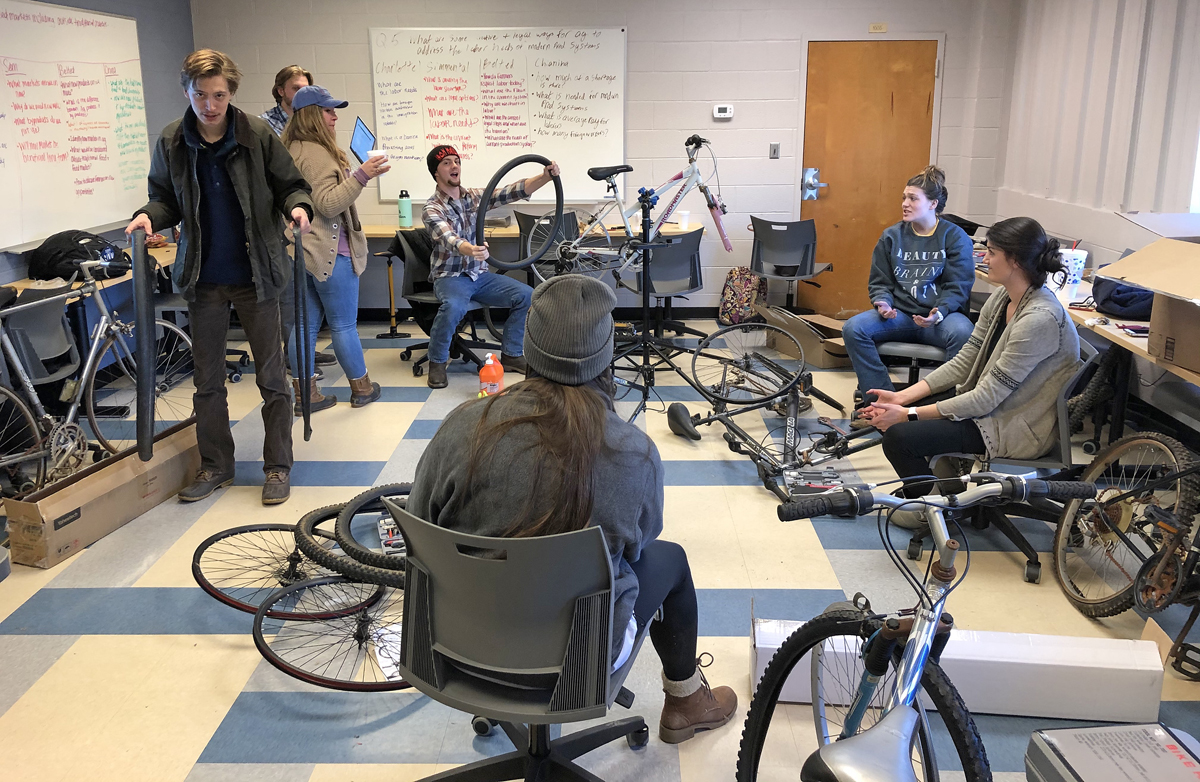 Members of the MTSU ag mechanics class work to repair bicycles they eventually donated to Murfreesboro nonprofit Greenhouse Ministries. (Submitted photo)