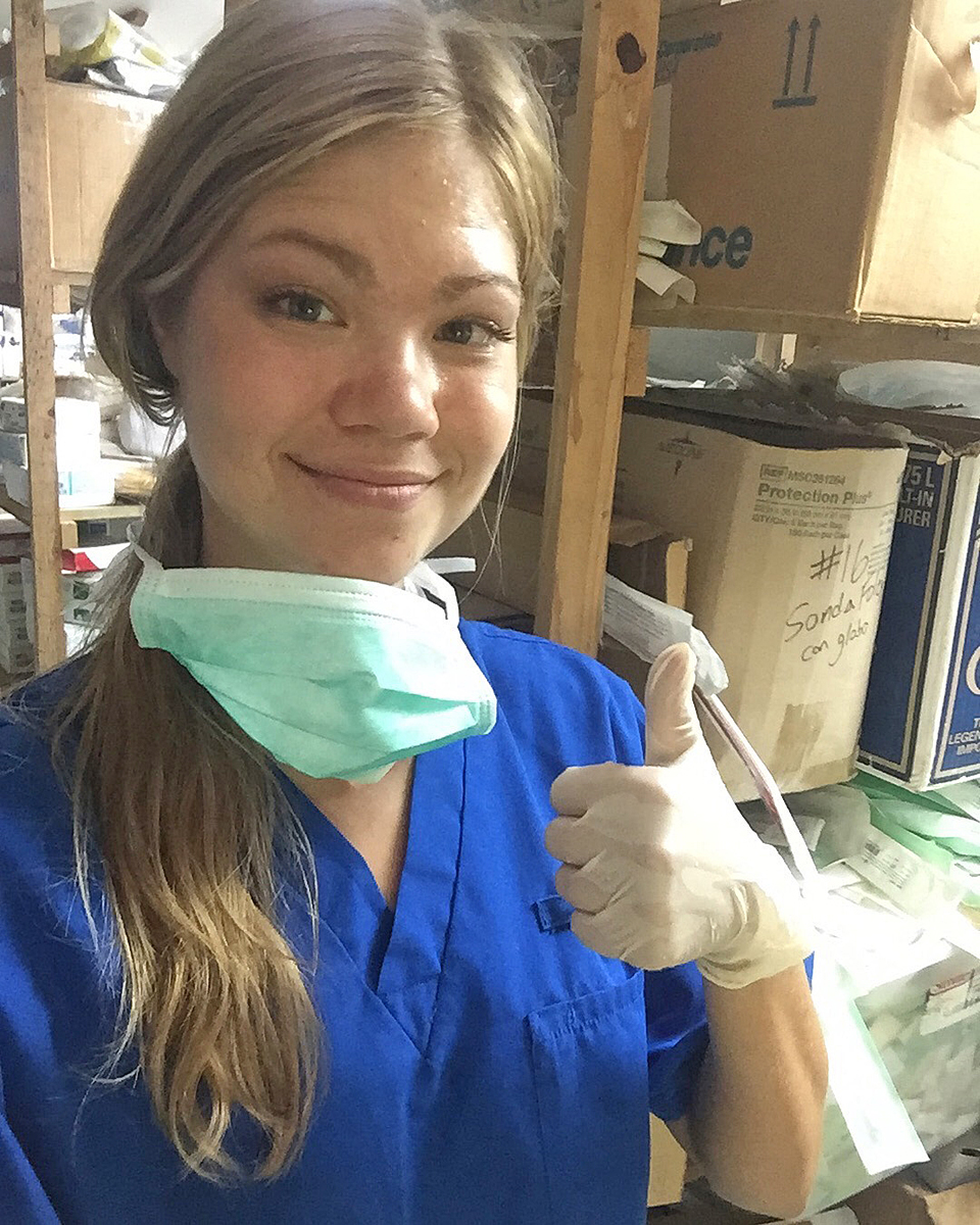MTSU Honors College rising senior Ella Morin of Knoxville, Tenn., gives a thumbs-up while collecting supplies on a medical mission trip to Honduras. She is a double major in biology and Spanish, utilizing the language skills as a translator and wanting to attend medical school after graduating from the university. (Submitted photo)