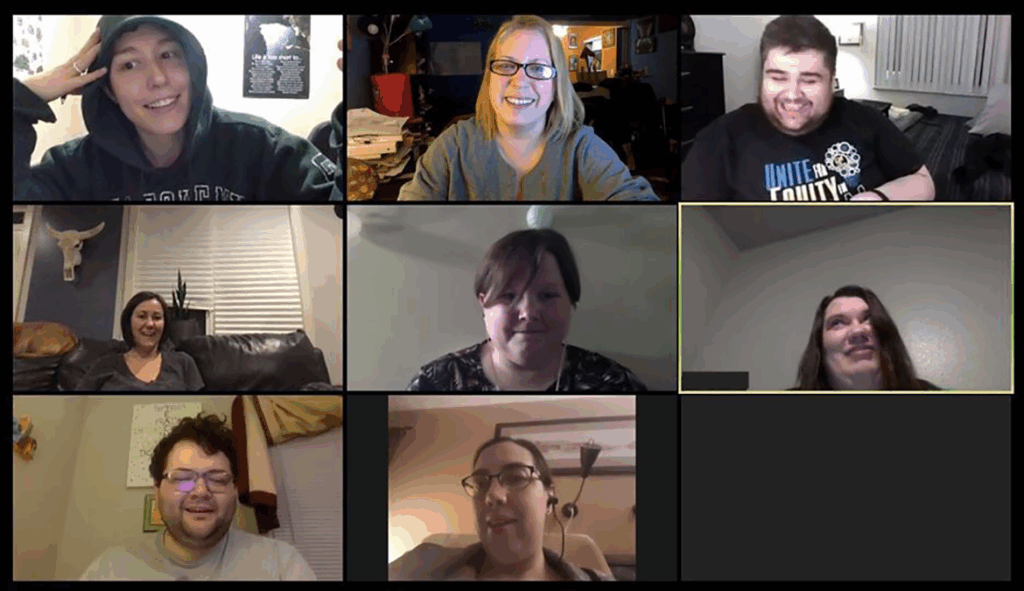 Students participating in a Zoom meeting to present fun, informative powerpoints amid the COVID-19 crisis. 8 students arranged into squares.