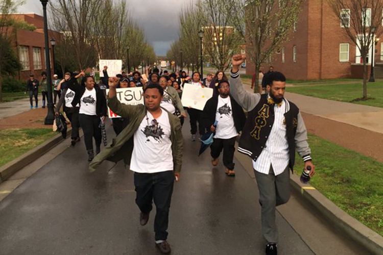Student protesters march to the executive residence of MTSU President Sidney A. McPhee on March 24, 2016. They demonstrated in favor of taking Confederate general Nathan Bedford Forrest’s name off the ROTC building on campus. (Photo by Lauren Frederick and submitted by Albert Gore Research Center)