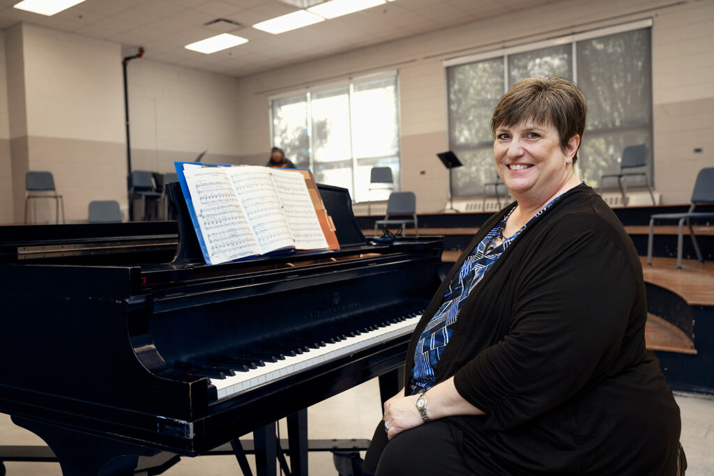Angela Tipps, Instructor in the School of Music, teaching a portion of the Women’s Chorale in the Saunders Fine Art Building.