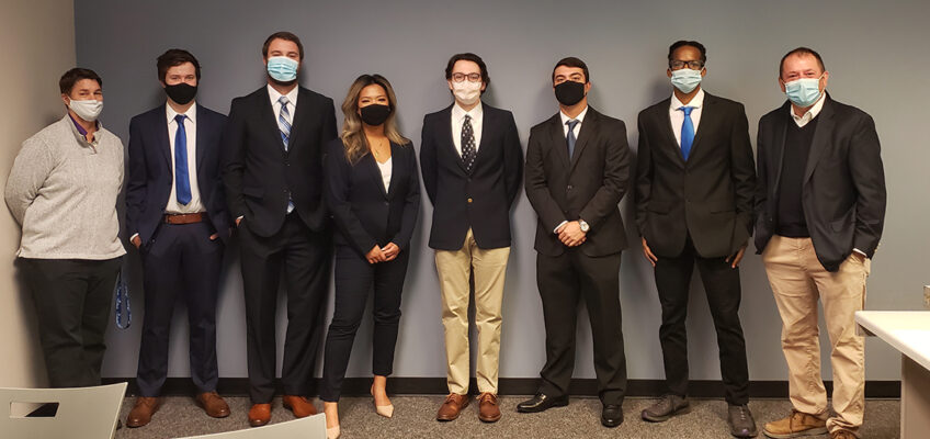 Members of MTSU’s National College Fed Challenge team recently filmed their video presentation inside the Business and Aerospace Building. The presentation, in which the student team made policy recommendations about the current economy, was submitted to representatives with the Federal Reserve for judging. Pictured, from left, are Dr. Anne Anderson, Weatherford Chair of Finance; seniors Aaron Stagner, a history major with an economics minor from Altoona, Iowa; Kyle Chandler, an economics major from Murfreesboro, Tenn.; Emma Praskach, an economics major from upstate New York; alternate Garrett Thurman, an economics major from McMinnville, Tenn.; Kannan Akins, an economics major from Lebanon, Tenn.; Joshua Smith, economics major from Nashville, Tenn.; and Dr. Stuart Fowler, economics professor. (MTSU photo by Jimmy Hart)