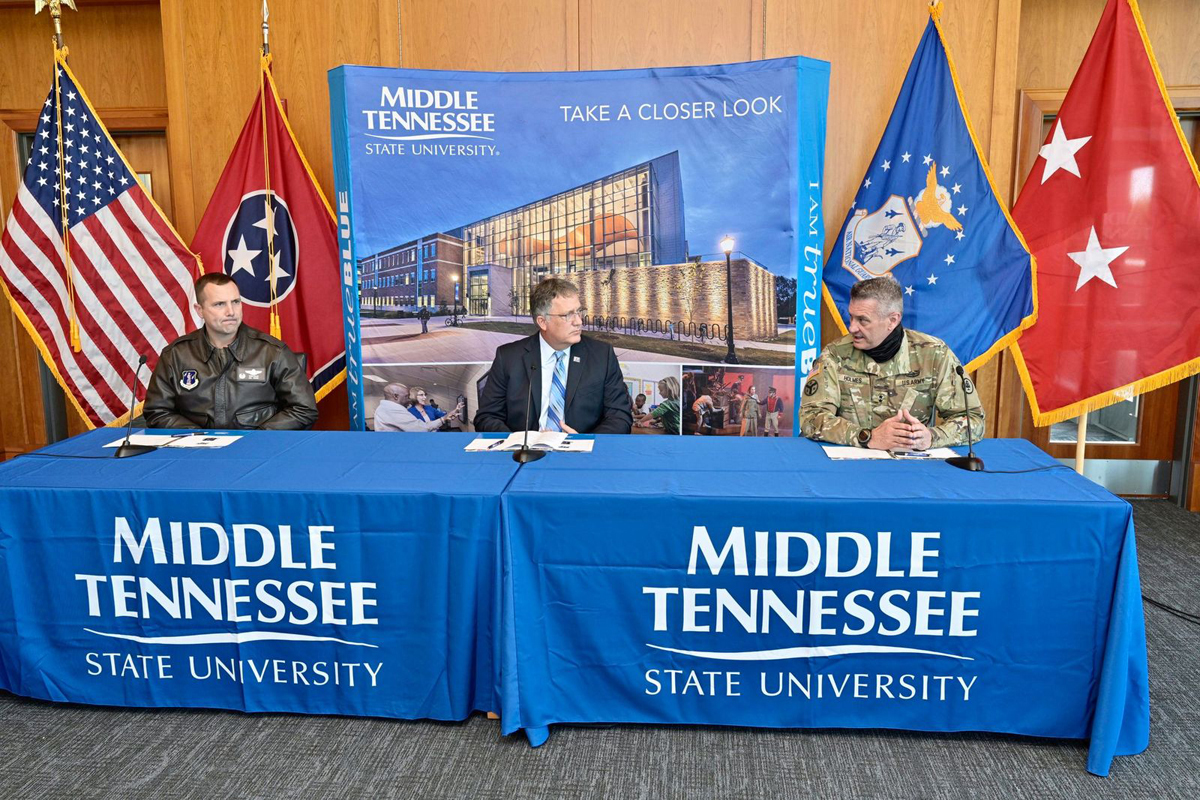 Wing Commander Todd A. Wiles, left, MTSU Provost Mark Byrnes and Tennessee Adjutant General Maj. Gen. Jeff Holmes discuss the merits of the new partnership that potentially will include unmanned aerial systems operations and computer science collaborative and research initiatives Tuesday, Nov. 3, in the Student Union Building’s President’s Executive Conference Room. (MTSU file photo by Andy Heidt)