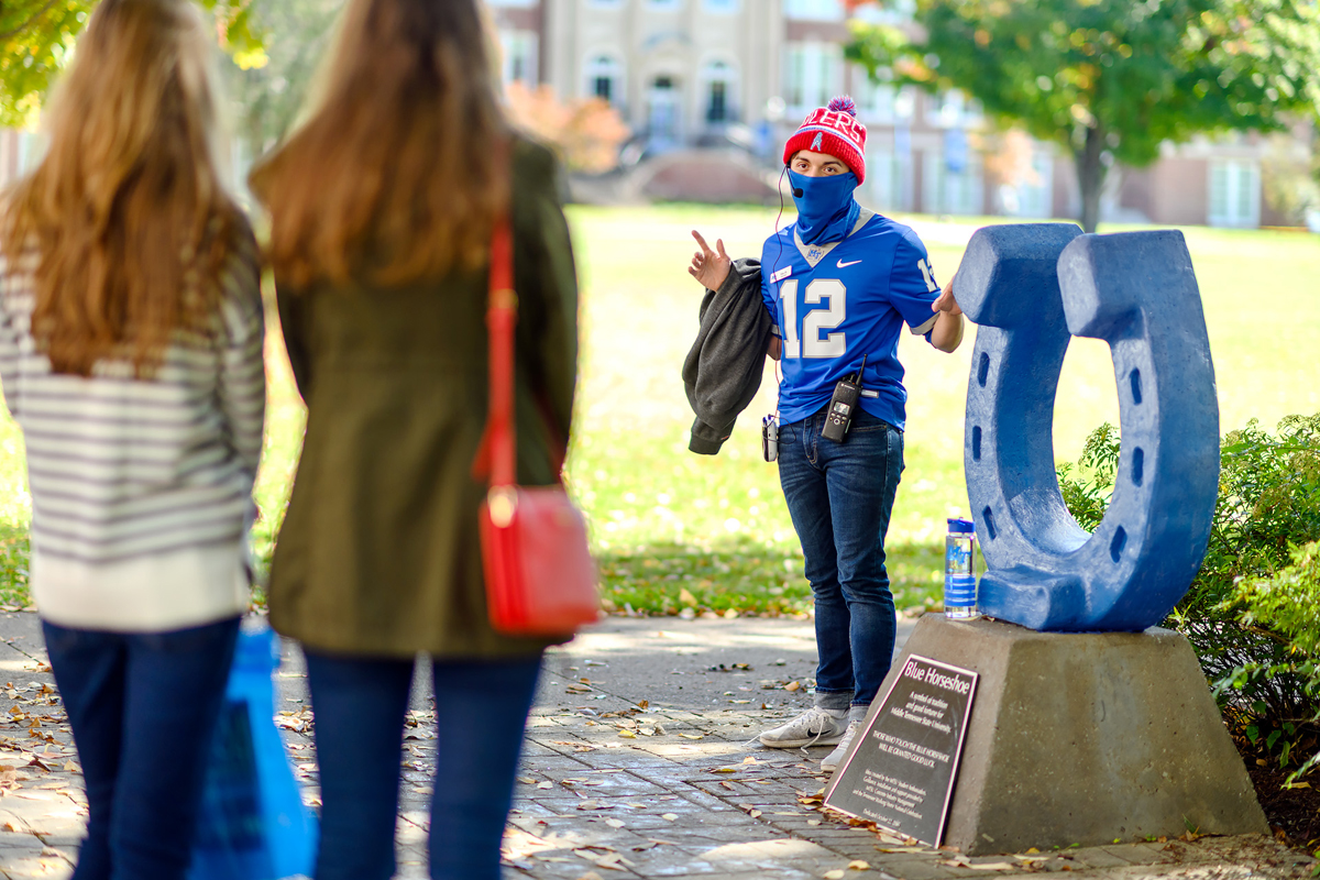 Wearing masks and social distancing because of COVID-19, prospective MTSU students and their parents listen to guide Tito Hernandez as they take one of the daily guided campus tours offered earlier this fall at the Blue Horseshoe near Peck Hall. The MTSU College of Basic and Applied Sciences has two scheduled CBAS Science Saturdays set for Jan. 30 and Feb. 20. (MTSU file photo by J. Intintoli)