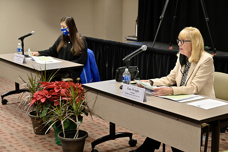 MTSU Trustee Pam Wright, right, gives the report of the Academic Affairs, Student Life and Athletics Committee, which she chairs, during the Board of Trustees meeting held Tuesday, Dec. 8, 2020, inside the Miller Education Center. At left is Student Trustee Delanie McDonald. (MTSU photo by Andy Heidt)