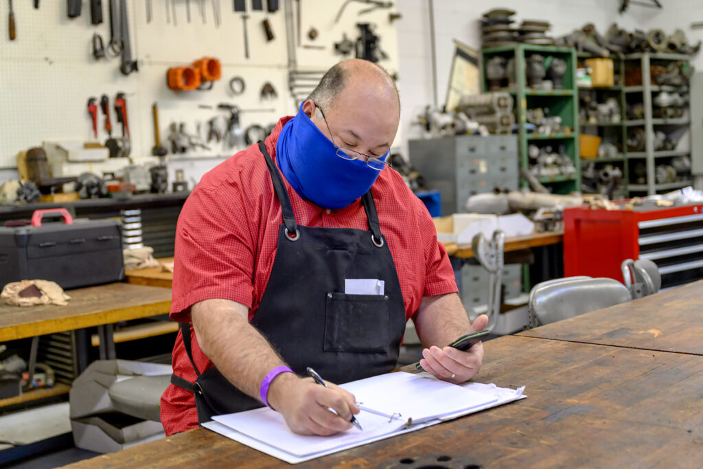 Bill Allen, Aerospace faculty in the maintenance hanger at the Murfreesboro Airport campus. (Photo: J. Intintoli)