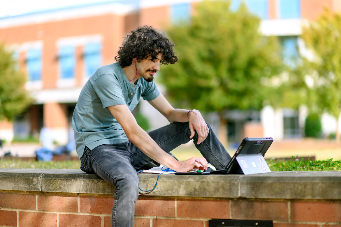 William Ferguson studying outside STU.
